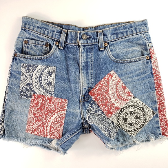 Levi's Pants - Levi's high waisted raw hem jean shorts light wash